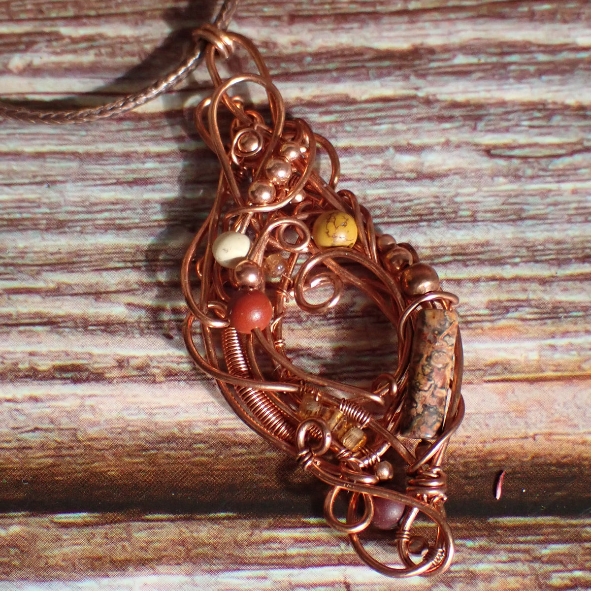 Thornfire Coil Pendant